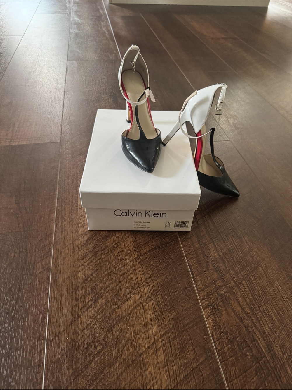 Calvin Klein Black and White Pointed Toe Ankle-Strap Stilettos